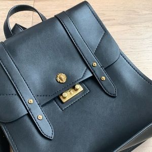 Anne Klein leather backpack with gold lion details
